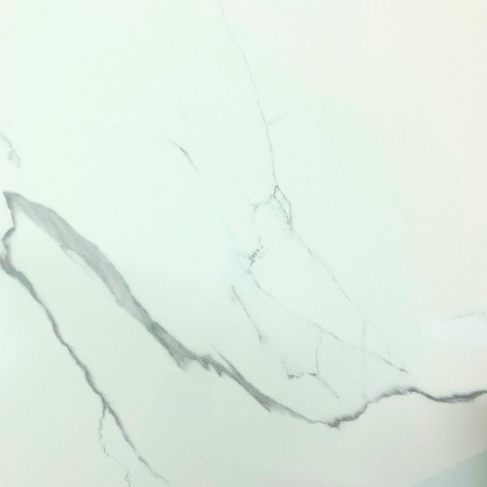 Tavolo allungabile Nefti con top in ceramica colore bianco statuario lucido con gambe bianche