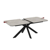 Tavolo allungabile Opera in piano lagina effetto marmo grigio opaco e struttura in metallo nero