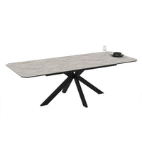 Tavolo allungabile Opera in piano lagina effetto marmo grigio opaco e struttura in metallo nero