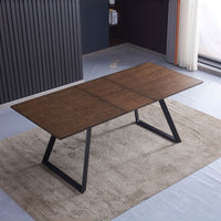 Tavolo allungabile Shelton con piano impiallacciato legno massiccio tinto noce e gambe in metallo nero