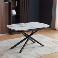 Tavolo girevole allungabile Astrid con piano in ceramica effetto marmo bianco lucido con gambe colore nero