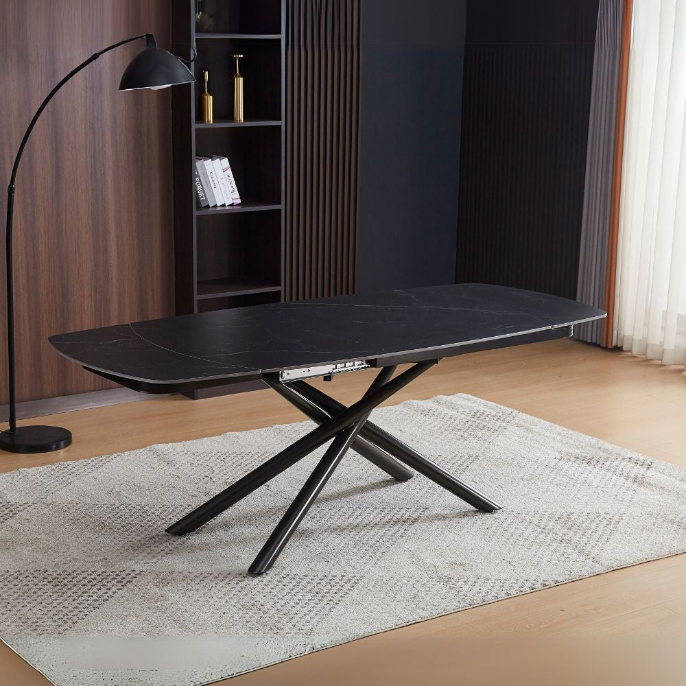Tavolo girevole allungabile Astrid con piano in ceramica effetto marmo nero opaco con gambe colore nero