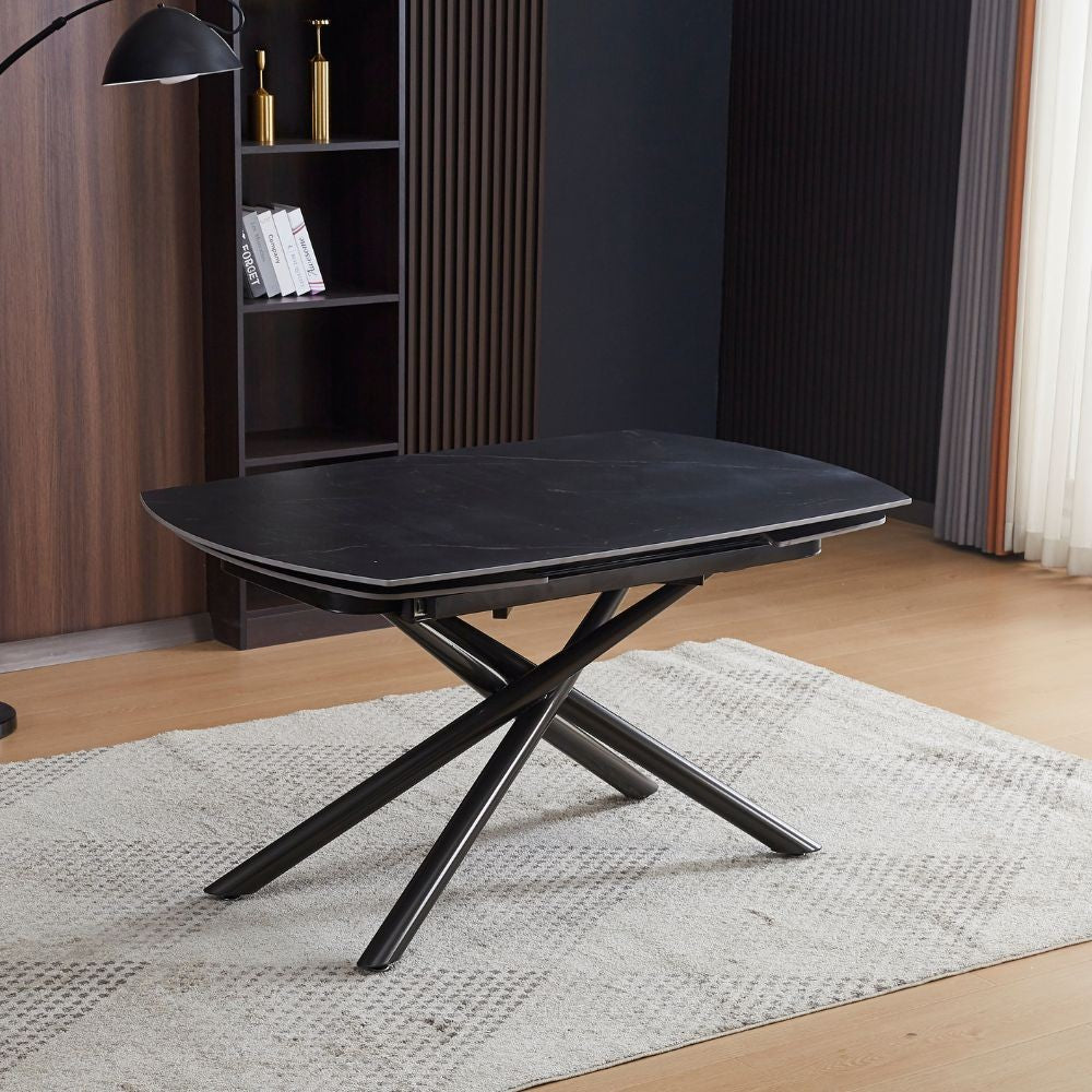 Tavolo girevole allungabile Astrid con piano in ceramica effetto marmo nero opaco con gambe colore nero