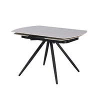 Tavolo girevole allungabile Kitti con piano in ceramica larice beige e gambe in metallo nero