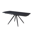 Tavolo girevole allungabile Kitti con piano in ceramica nero opaco e gambe in metallo nero