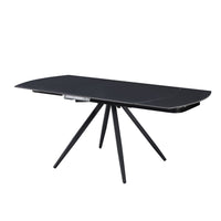 Tavolo girevole allungabile Kitti con piano in ceramica nero opaco e gambe in metallo nero