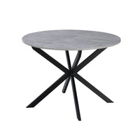 Tavolo rotondo allungabile Rut con piano colore cemento e gambe in metallo nero