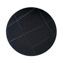 Tavolo rotondo Dot con piano in ceramica effetto marmo nero opaco con particolari oro e gamba nera