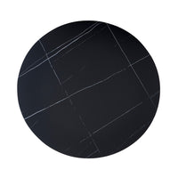 Tavolo rotondo Dot con piano in ceramica effetto marmo nero opaco con particolari oro e gamba nera