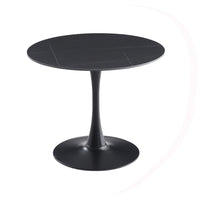 Tavolo rotondo Dot con piano in ceramica effetto marmo nero opaco con particolari oro e gamba nera